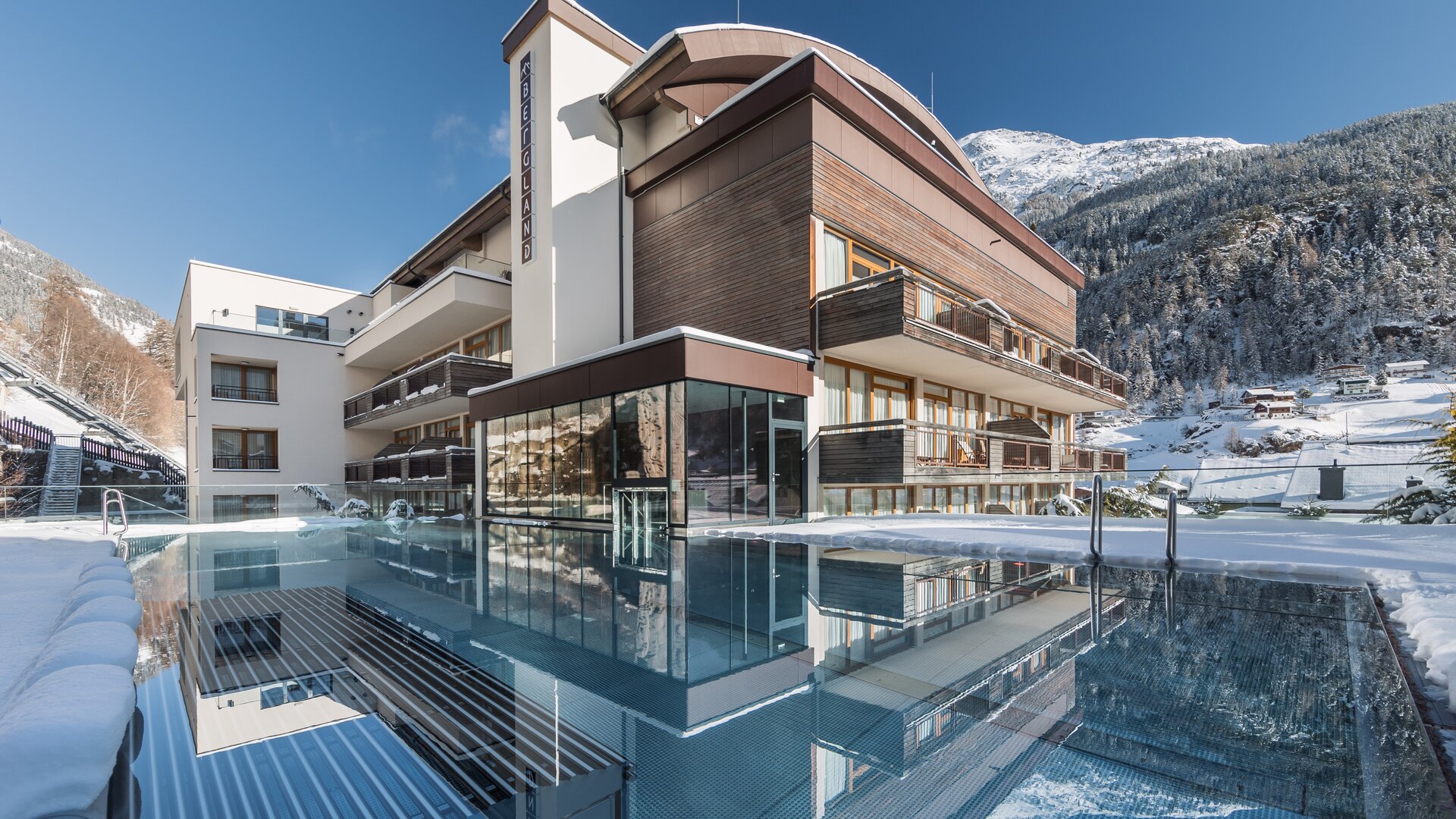 hotel with outdoor pool in winter